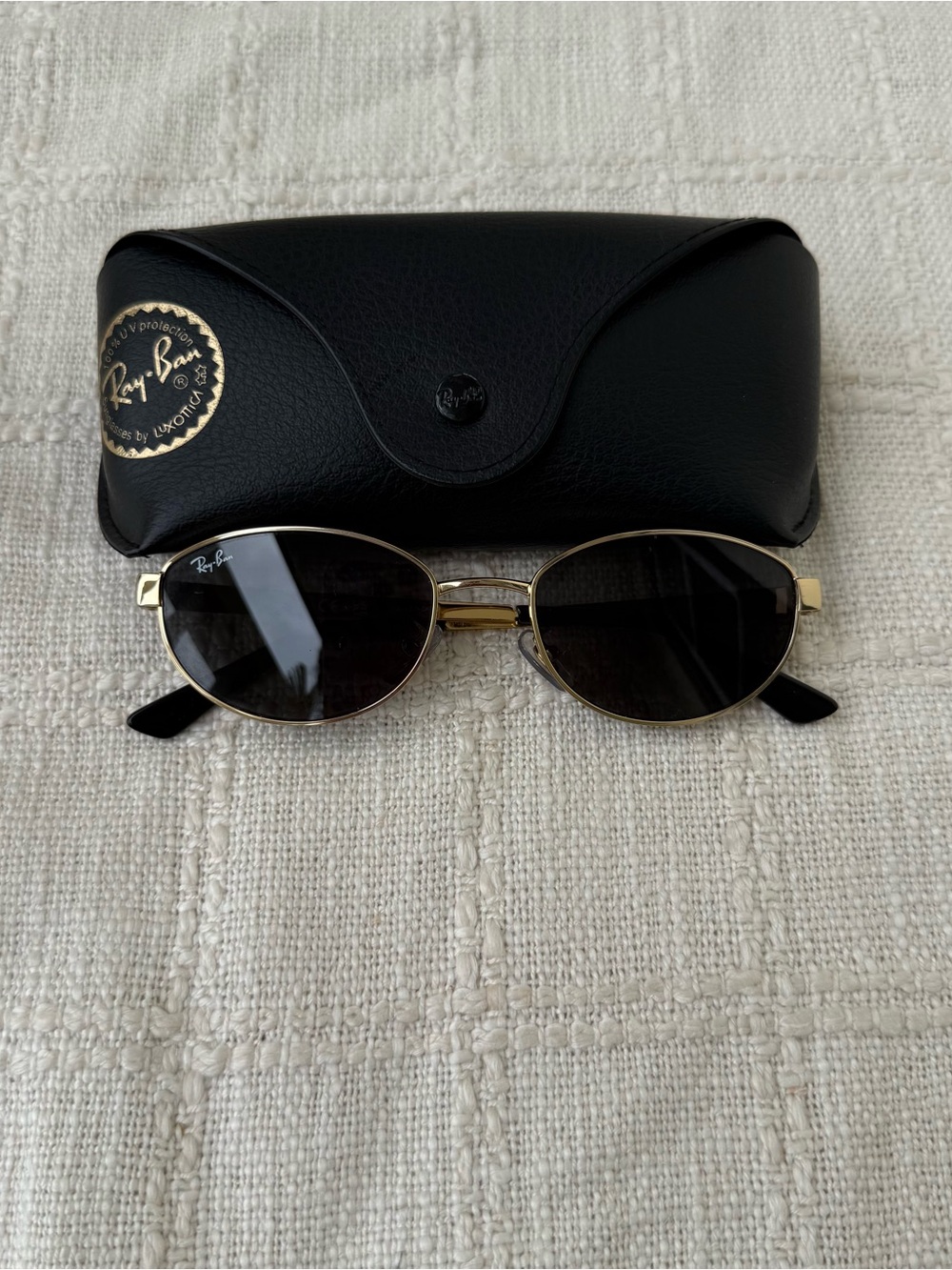 Ray-Ban Gold Oval Frame Sunglasses with Black Lenses
